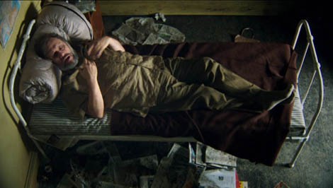 Slavoj Zizek critiques Taxi Driver in a recreation of Travis Bickel's room from The Pervert's Guide to Ideology (2012)