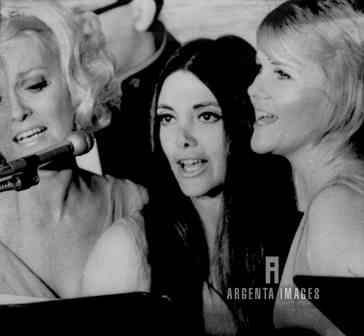 Carol Feraci, the surprise protestor, is in the center