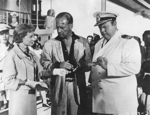 Sylvia Syms, Curd Jurgens and Orson Welles (right) in Ferry to Hong Kong