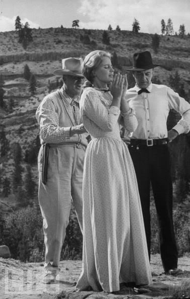 Director Delmer Daves (left), Maria Schell and Gary Cooper on the set of The Hanging Tree (1959)