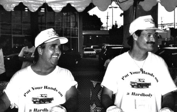 J.D. Drew (left) & Benny Perkins are formidable contest rivals in Hands on a Hard Body (1997)