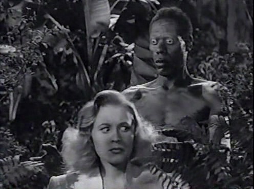 Darby Jones sneaks up on Anne Jeffreys in Zombies on Broadway (1945)