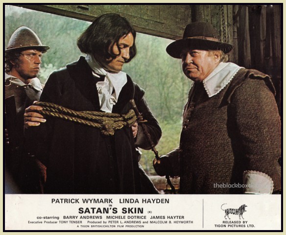 A man (Simon Williams) driven insane after a night of terror is lead away in The Blood on Satan's Claw (1971)