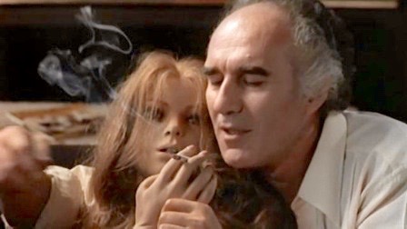 Two lovers share a cigarette in Life Size (1974), directed by Luis Garcia Berlanga