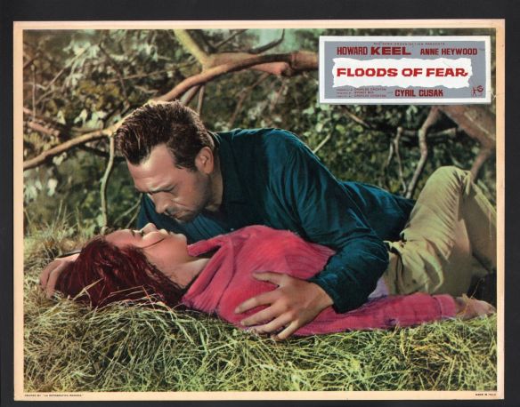 A brief romantic interlude for Howard Keel and Anne Heywood in the disaster drama, Floods of Fear (1958)