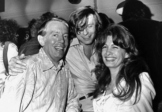 The English theatre critic Kenneth Tynan (left) with his wife, Kathleen, and the Polish filmmaker Roman Polanski (c), 1971. Image by © Hulton-Deutsch Collection/CORBIS