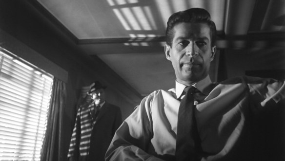 Bernard Lee (background) and George Nader in Nowhere to Go (1958)