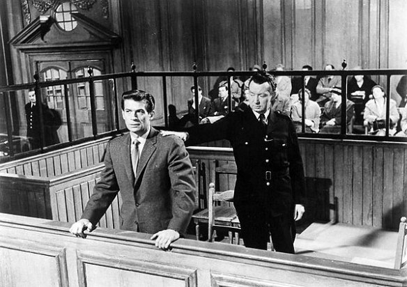 George Nader as con artist Paul Gregory receives an unexpectedly harsh sentence in this scene from Nowhere to Go (1958)