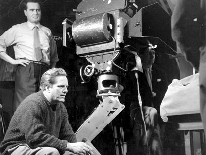Director Seth Holt (sitting, left) on the set of Nowhere to Go (1958)