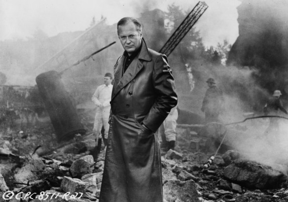 Curd Jurgens as scientist Wernher von Braun witnesses the effects of his V-2 missiles in I Aim at the Stars (1960)