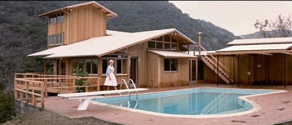 Kim Novak outside the dream house being designed by architect Kirk Douglas in Strangers When We Meet (1960).