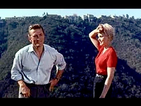 Kirk Douglas & Kim Novak star in Strangers When We Meet (1960), directed by Richard Quine