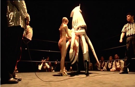 The Calamari Wrestler parodies the rituals of the ring and everything else.
