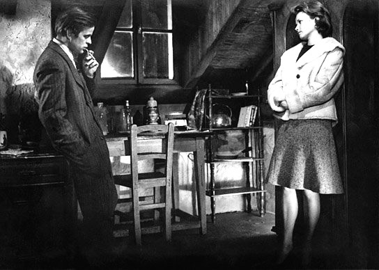 Klaus Kinski is a mysterious refugee and Brigitte Grothum is a farmer's daughter who gives him refuge in Der Rote Rausch (1962).