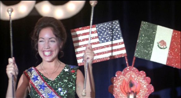 Maria O'Brien as Marie, prepares for her baton specialty act in Smile (1975)