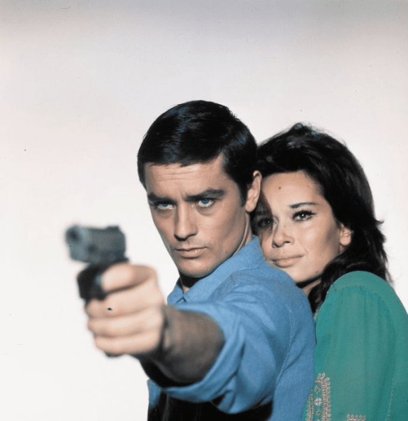 A publicity still of Alain Delon and Lea Massari in Alain Cavalier's L'Insoumis (1964).